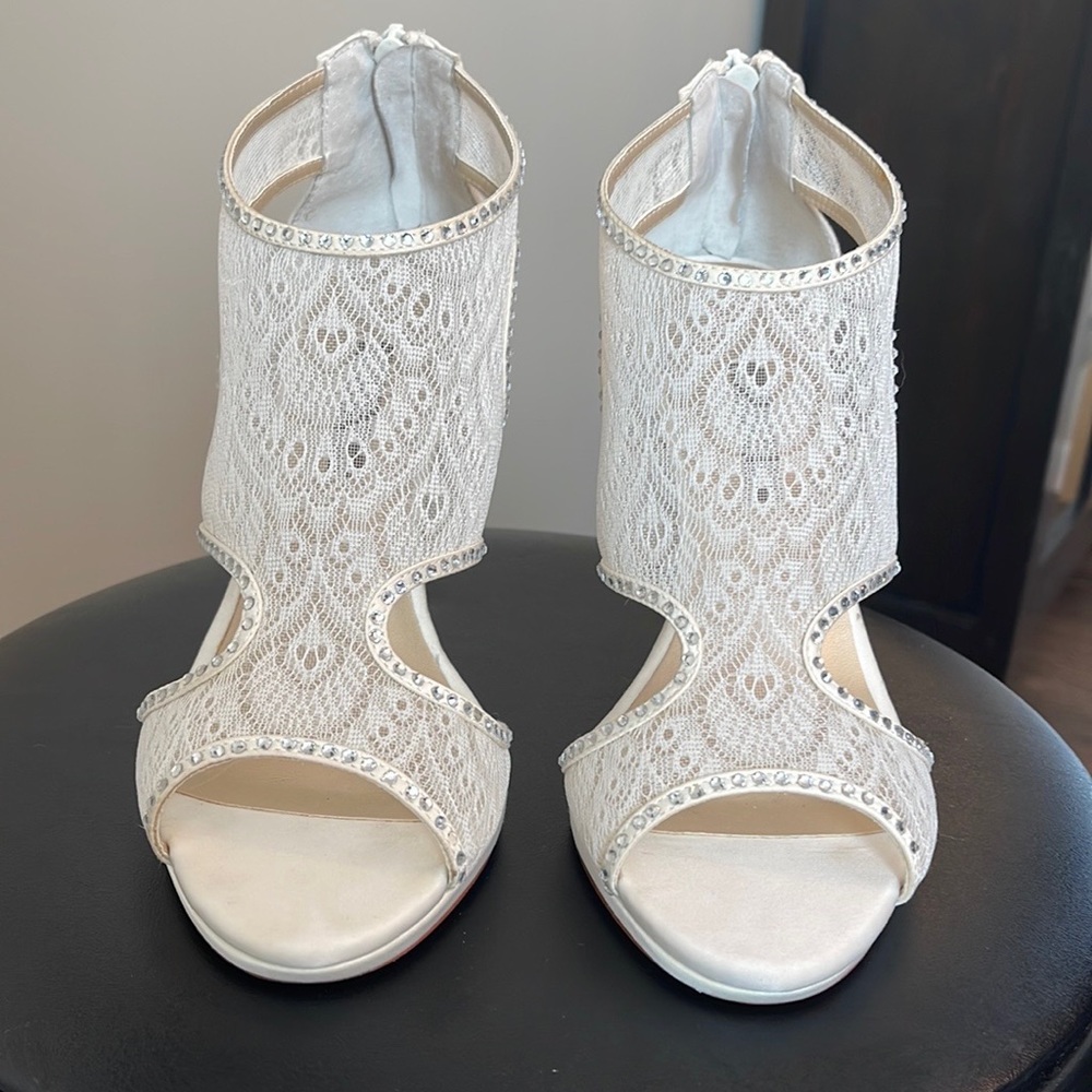 Size 7 Caparros white dress sandals.